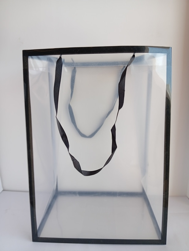 ساک دستی طلقی دسته پانچی با بند روبانی در 6 رنگ ابعاد 25*18*35 cm بند