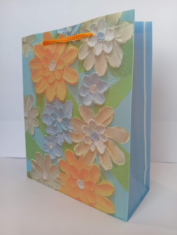 پاکت کادویی طلقي طرحدار با طرح گل و بند زنبوری رنگی (5 مدل)22*18*7 cm نارنجی