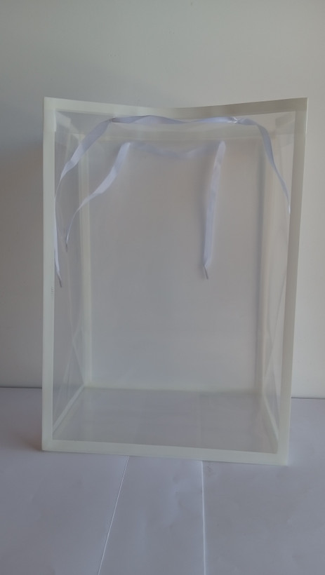 ساک دستی طلقی دسته پانچی با بند روبانی در 6 رنگ ابعاد 25*18*35 cm سفید