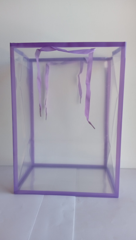 ساک دستی طلقی دسته پانچی با بند روبانی در 6 رنگ ابعاد 25*18*35 cm یاسی
