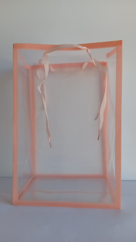 شاپینگ بگ شفاف دسته پانچی بند روبانی ابعاد 20*16*30 cm گلبهی